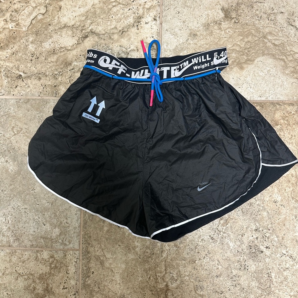 Nike Black Athletic Shorts with White and Blue Accents